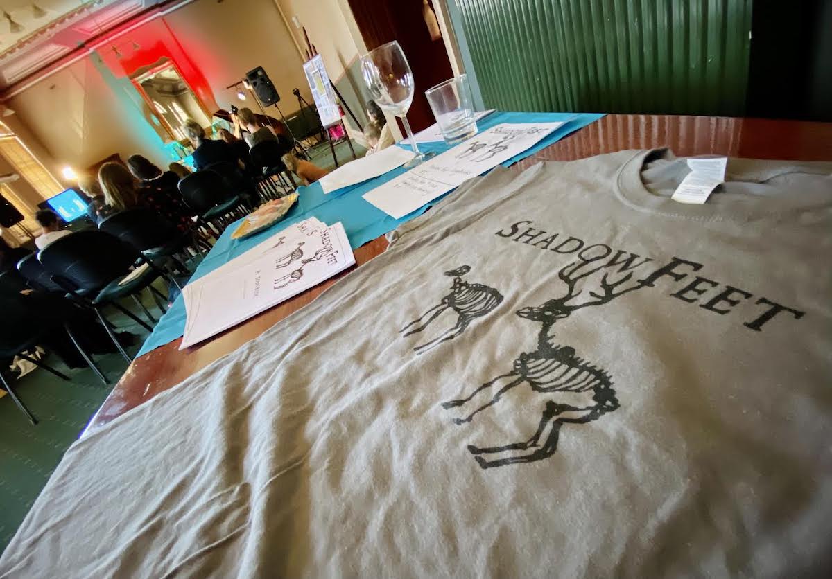 Shadow Feet merch at Gather party (by Erin)